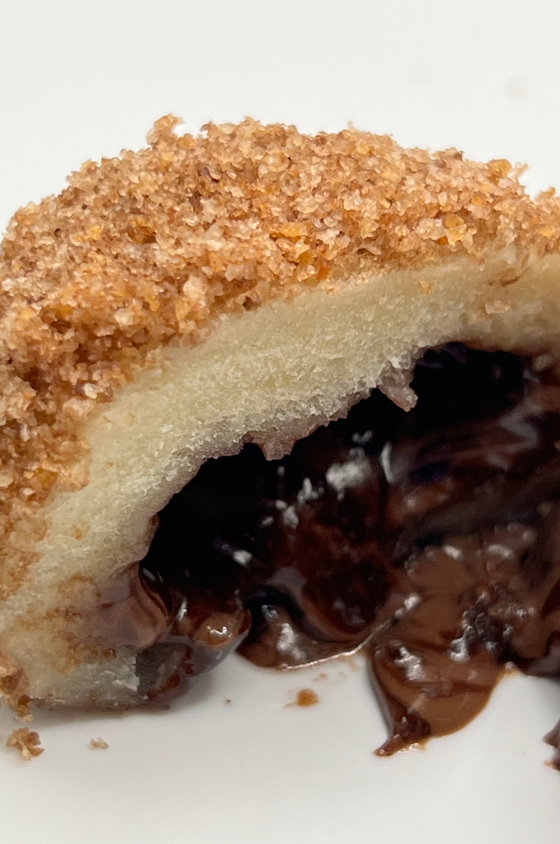 Nutella knedla is made for chocolate lovers.   We start by filling our signature potato dough with the original Nutella spread known for its rich taste of hazelnut and chocolate. We then hand-make a knedla ball and coat it with more hazelnuts and cacao! Scrumptious!